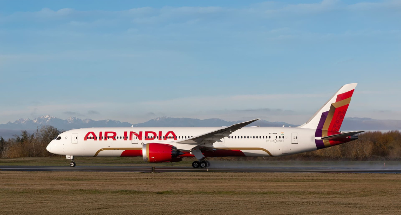 Air India Boeing 787 wide-body aircraft taxiing on runway, part of the fleet supported by HAECO line maintenance services.