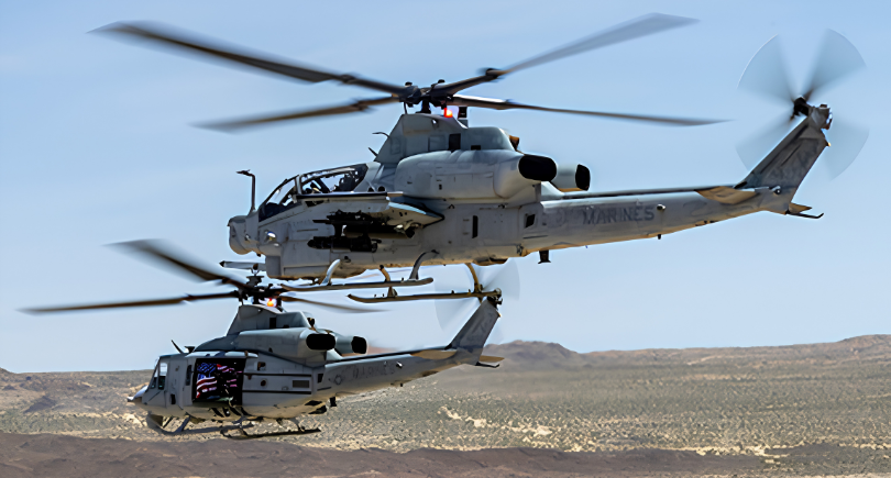 A US Marine Corps AH-1Z Viper and UH-1Y Venom helicopter undergoing Bell's SPINE modernization upgrades.
