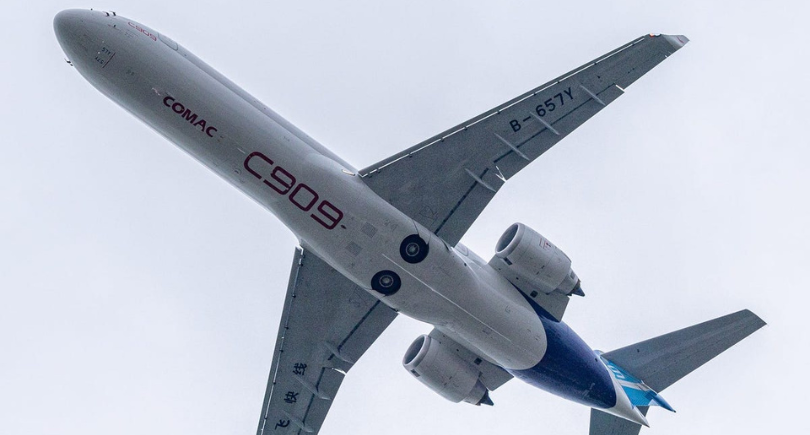 COMAC C909 regional jet in flight following Air Cambodia's 20-aircraft order.