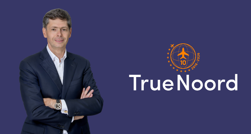 TrueNoord CEO Anne-Bart Tieleman pictured beside company logo