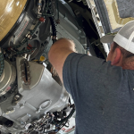 Aircraft mechanic performing APU maintenance work