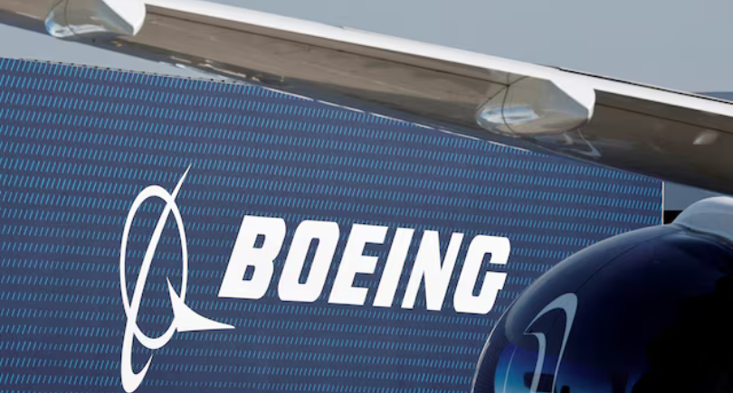 Boeing logo displayed on an aircraft engine and fuselage.