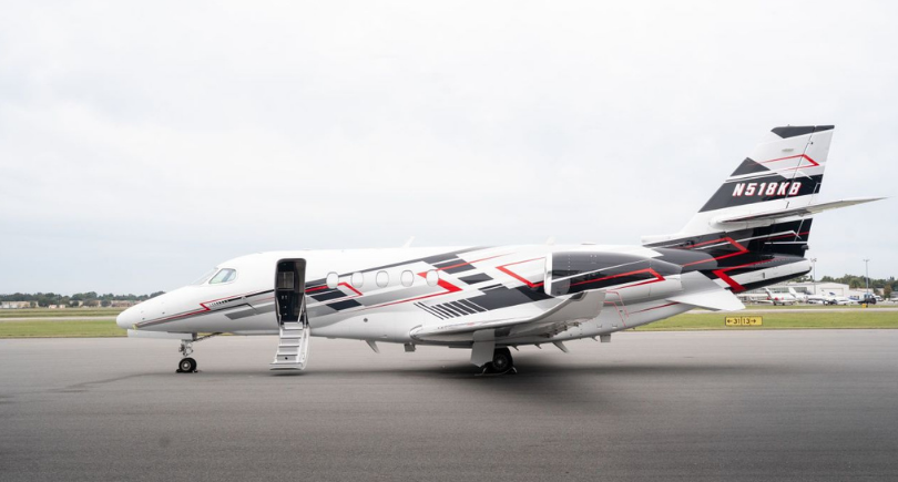 Business jet on airport tarmac after Fly Alliance acquisition