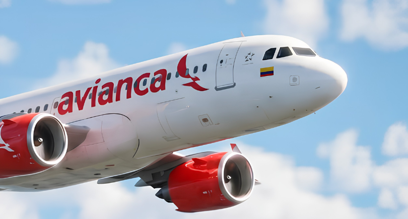 Avianca aircraft flying against a blue sky