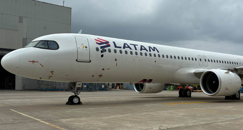 LATAM Airbus A321neo parked outside an aircraft hangar