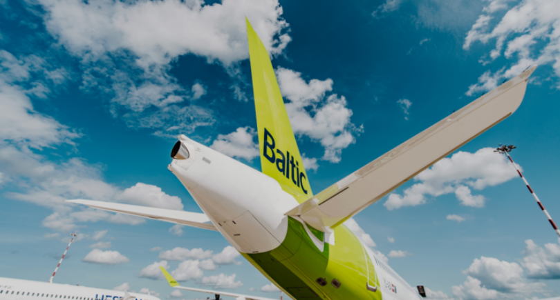 airBaltic aircraft viewed from below on the ground