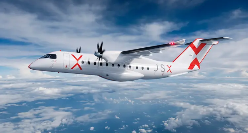 JSX regional aircraft flying above the clouds