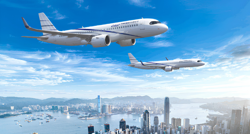 CALC aircraft flying over Hong Kong skyline and Victoria Harbour