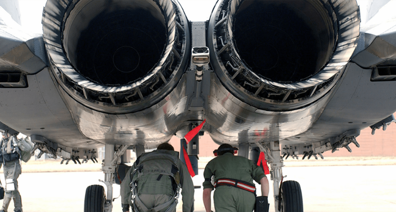 F-15 engine undergoes maintenance by ground crew
