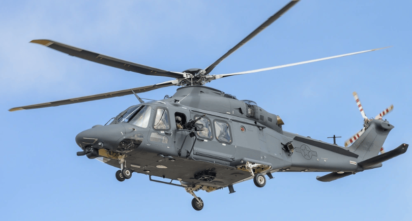 Boeing MH-139A Grey Wolf helicopter flying against blue sky