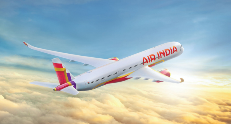 Air India aircraft flying above clouds as the airline expands its MRO operations.