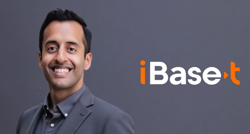 Andrew Varghese pictured alongside the iBase-t logo following his CFO appointment.
