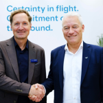HAECO and TESTFUCHS representatives shake hands to mark their LEAP testing partnership.